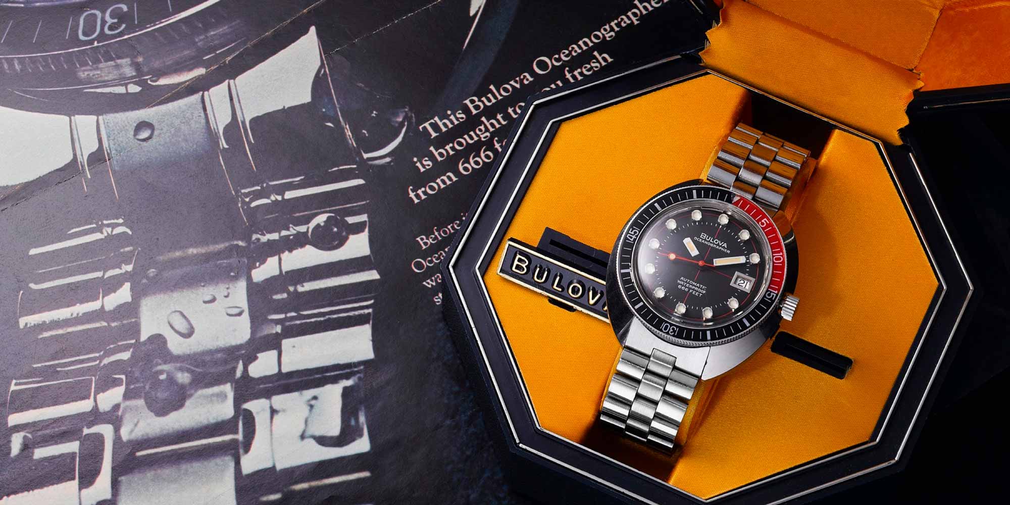 Reloj metálico de esfera negra con detalles en rojo de la colección Oceanographer "Devil Diver" de relojes Bulova, un homenaje al buceo de profundidad. Relojes resistentes al agua.